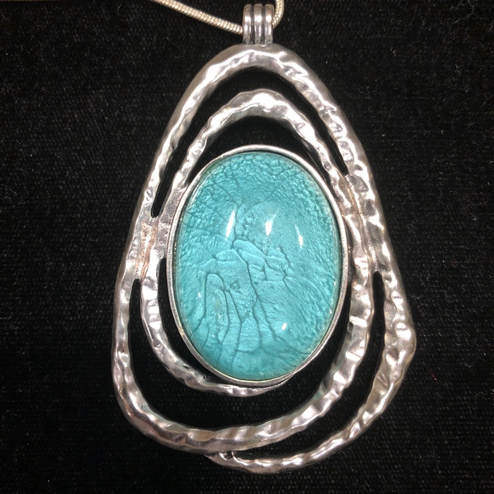 Turquoise necklace with silver chain.